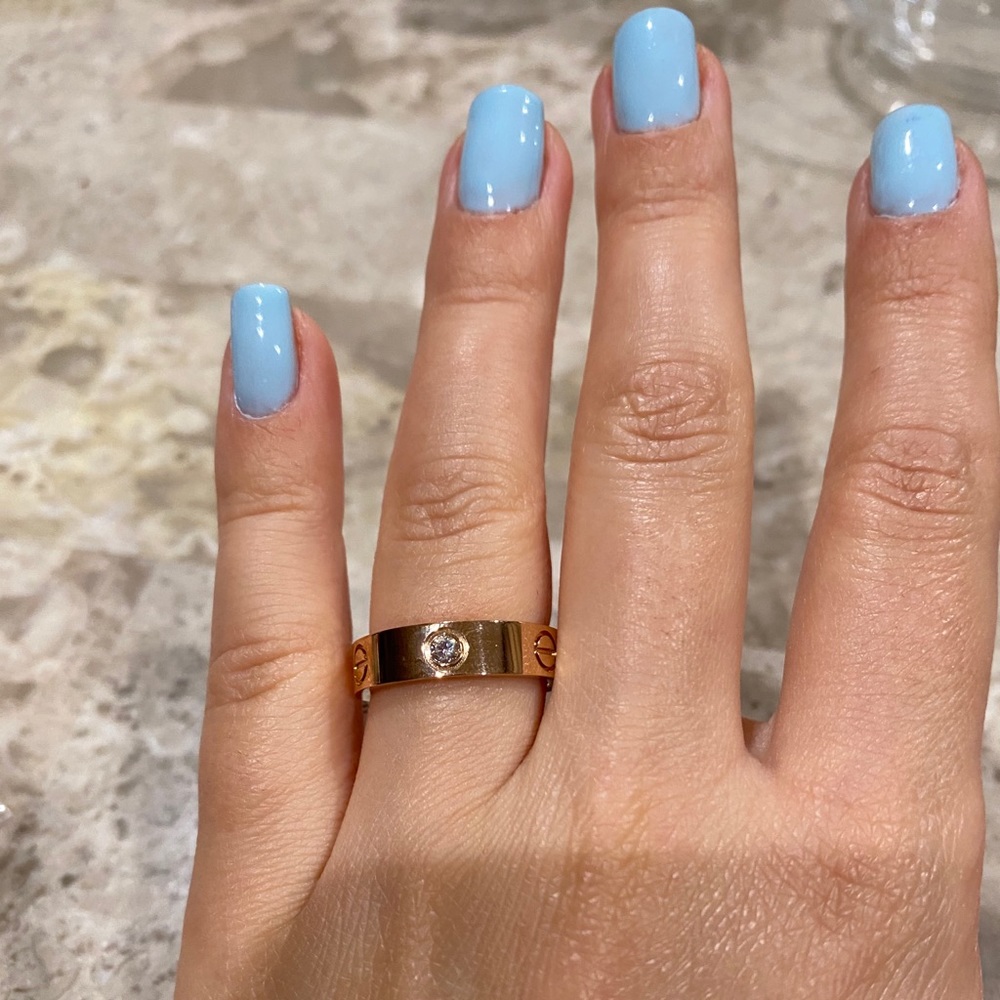 Rose gold ring with stones